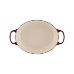 LE CREUSET Cocotte en Fonte Ovale 31 cm Garnet Bouton Doré Signature* Cocotte En Fonte