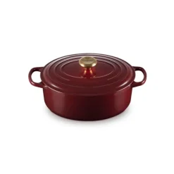LE CREUSET Cocotte en Fonte Ovale 29 cm Garnet Bouton Doré Signature* Cocotte En Fonte